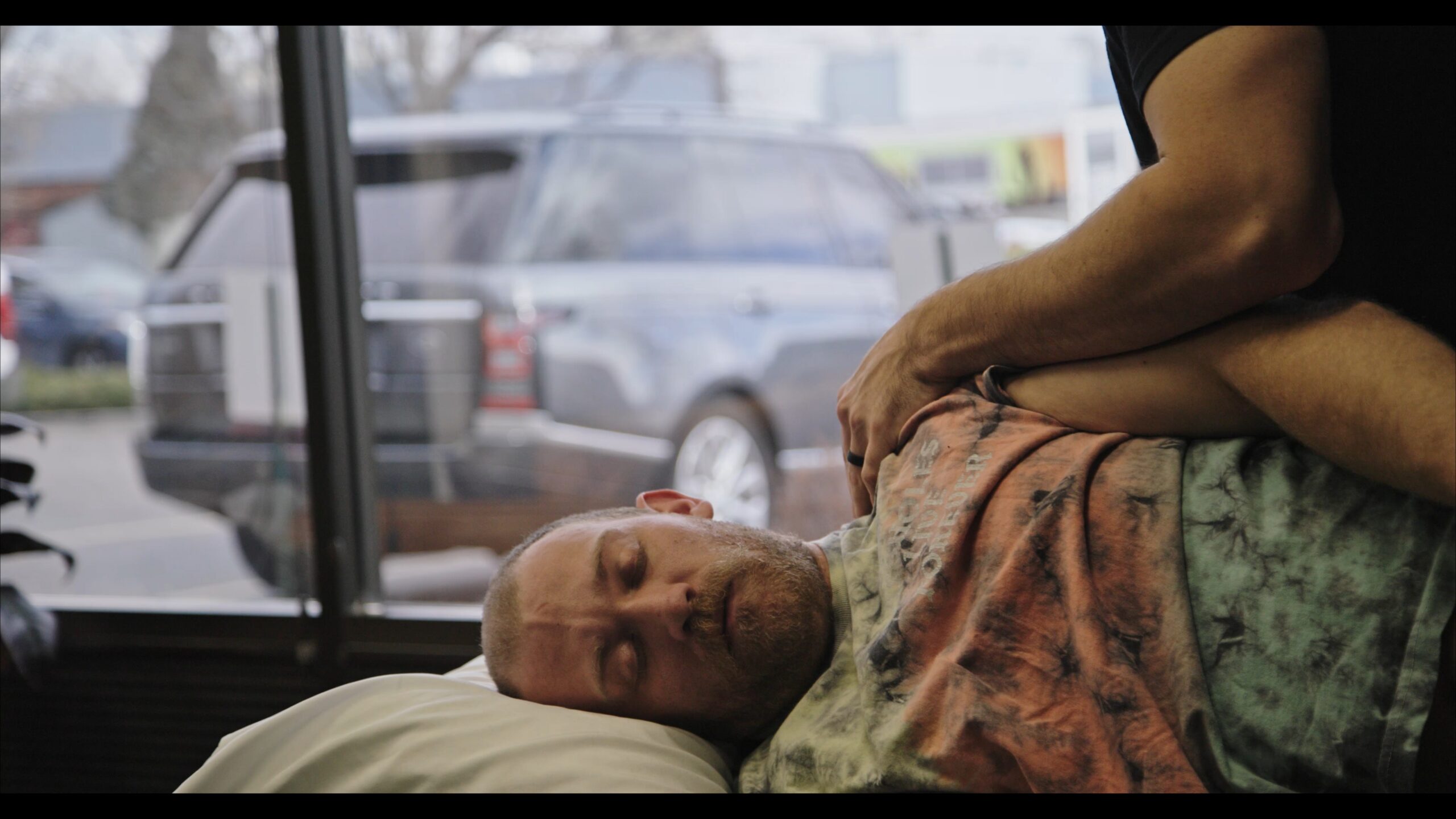 Shoulder assessment during a physical therapy session at UpSlope